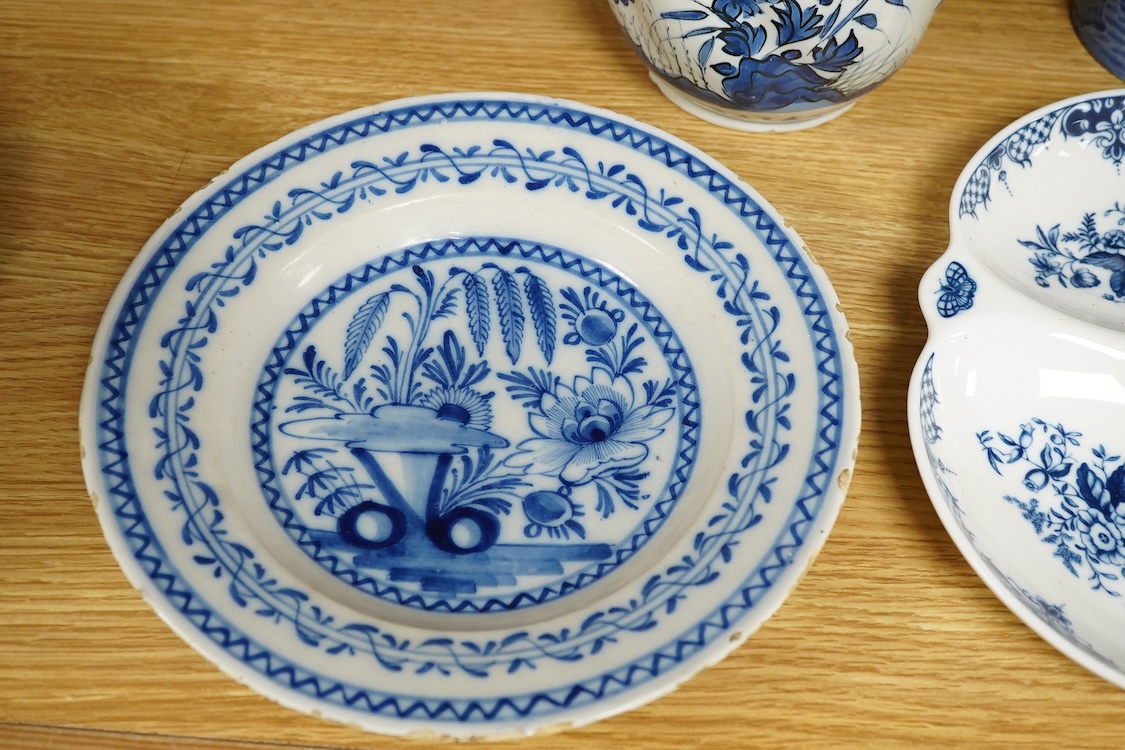 An 18th century Delft jug, another tin glazed dish, a Worcester Hanbury dish and five pieces of Copeland Spode Italian blue and white, tallest 22.5cm